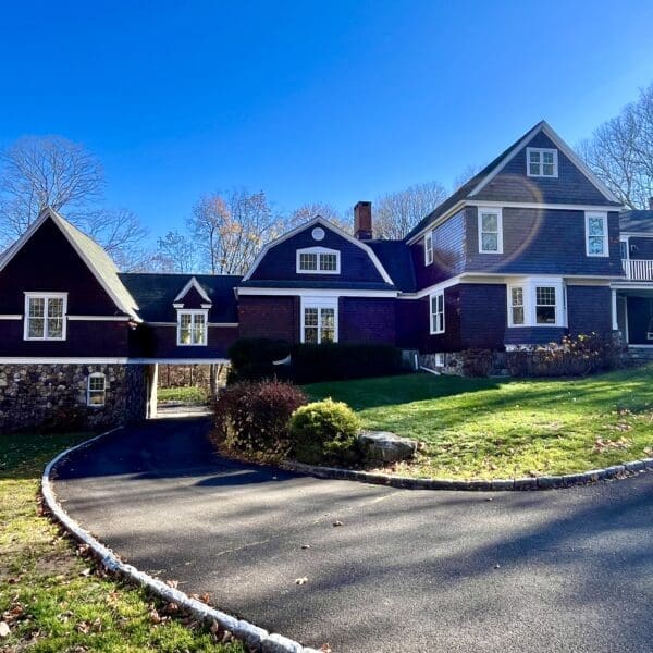 A large house with many windows and doors.