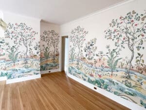 Colorful mural depicting nature and trees.