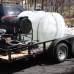 Trailer with water tanks and equipment.