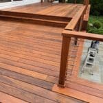Spacious hardwood deck with cable railing